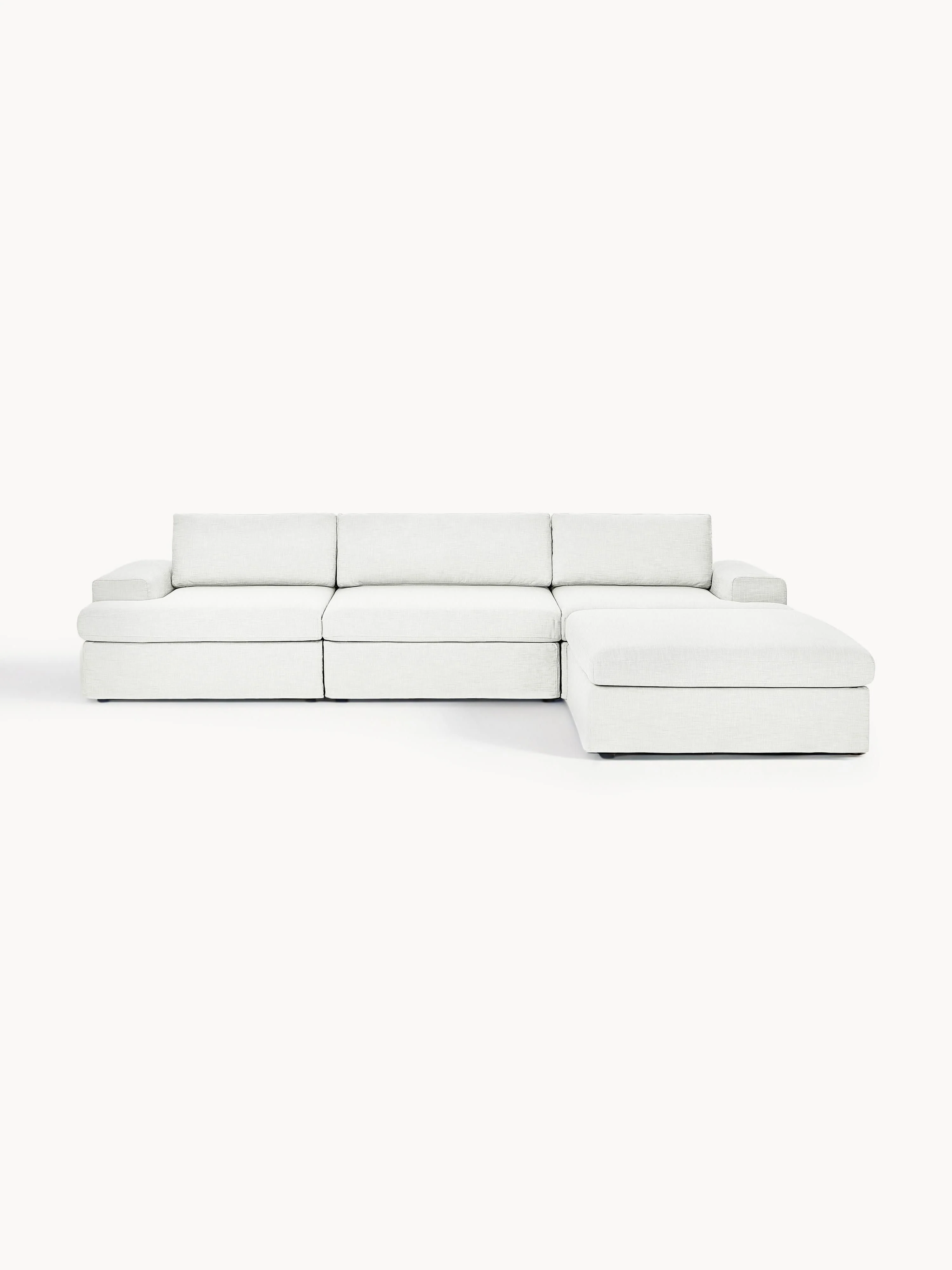 Modulares Sofa Russell (4-Sitzer) mit Hocker (links/rechts)