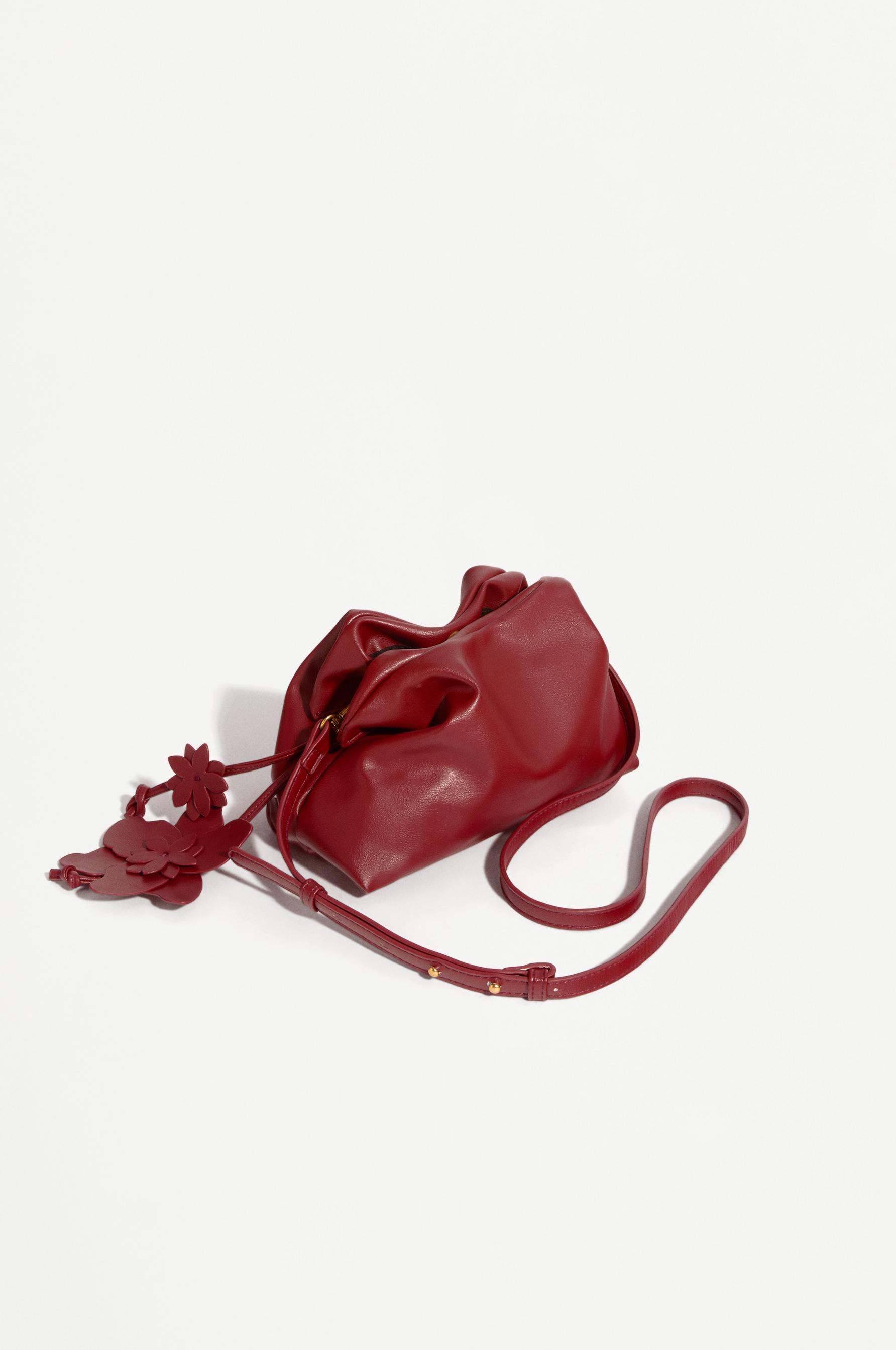 Bolso pouch flor