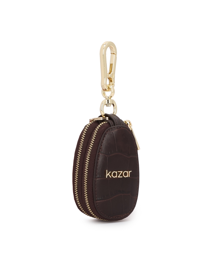 Brown leather key case with embossed pattern