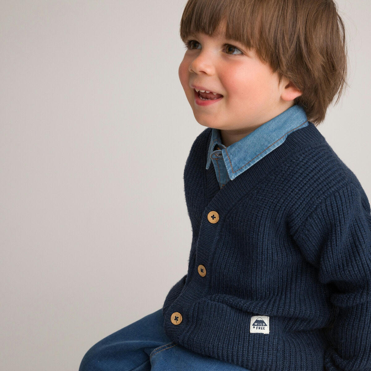Gilet col V en grosse maille boutonné