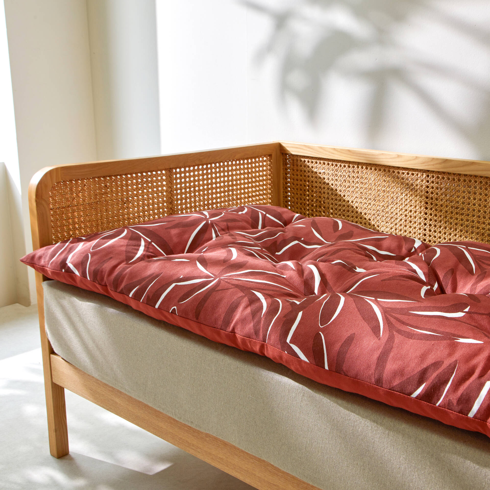 Long coussin de sol imprimé feuillage