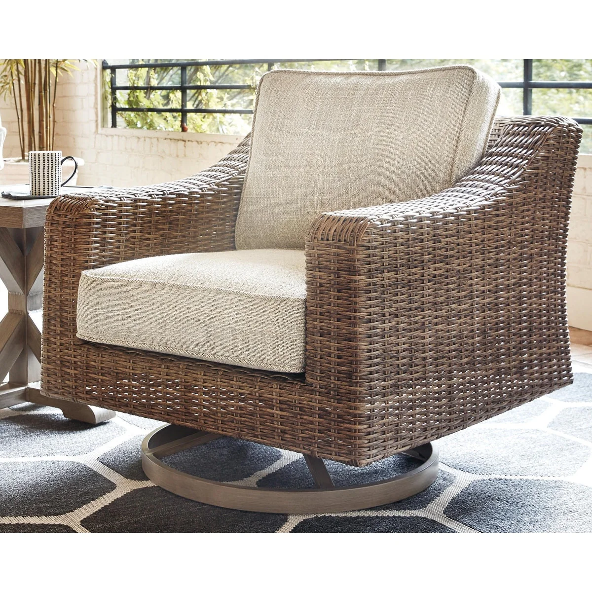 Signature Design by Ashley Beachcroft Hand-woven Wicker-look Swivel Chair - 35.38 W x 38.13 D x 34 H