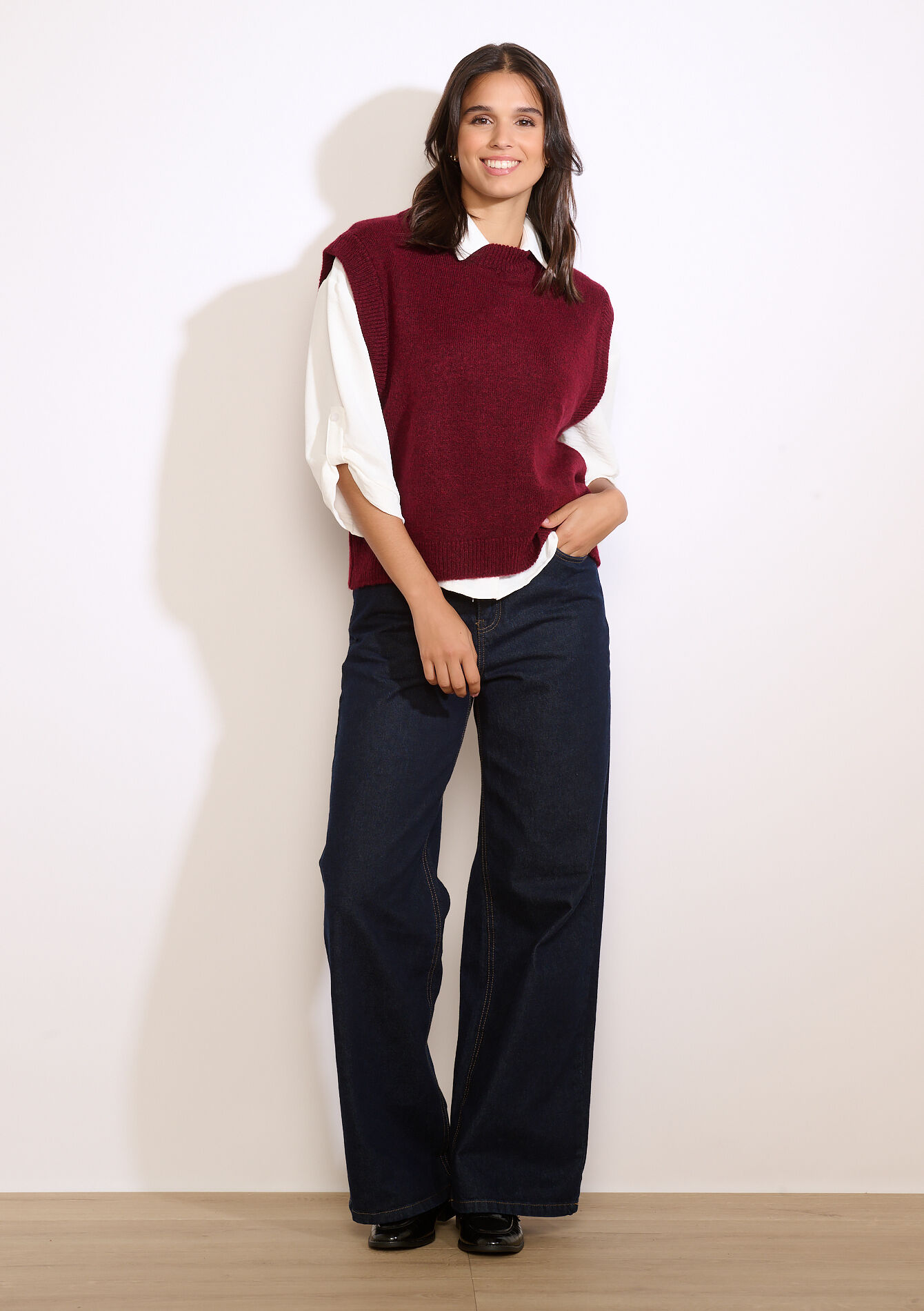 Mouwloze gebreide trui