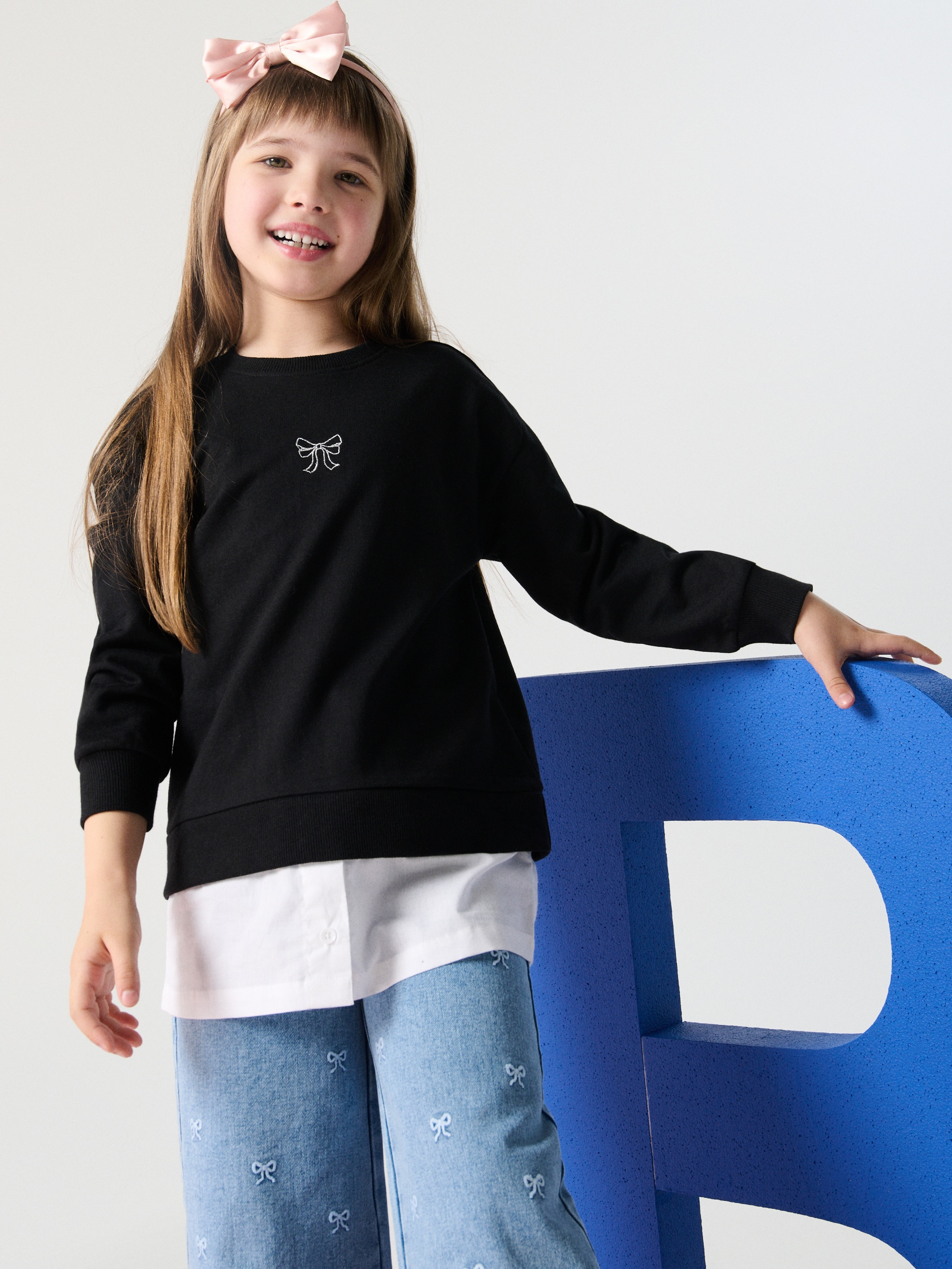 Bluza z doszytym dołem koszulowym
