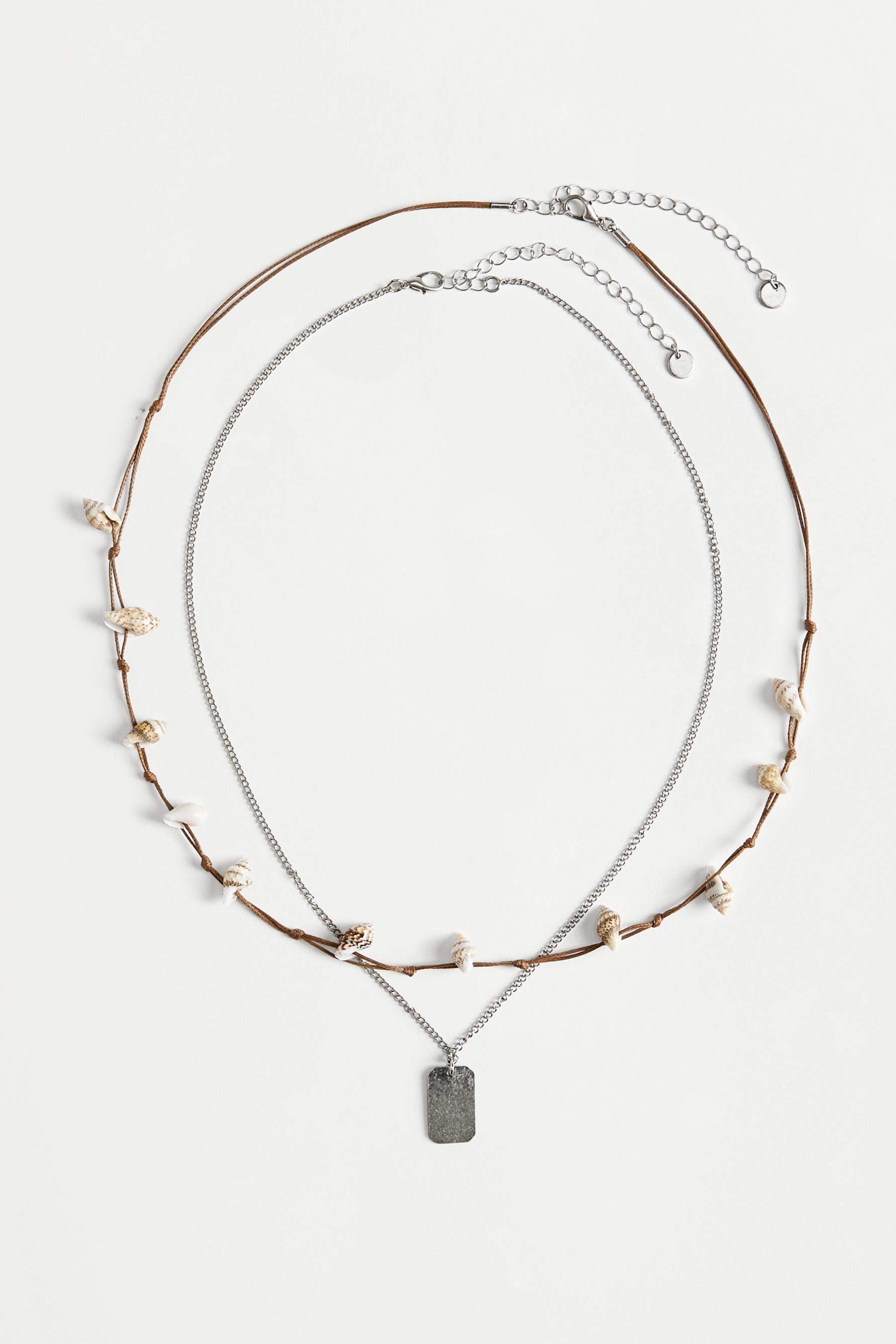 Collar doble conchas colgante