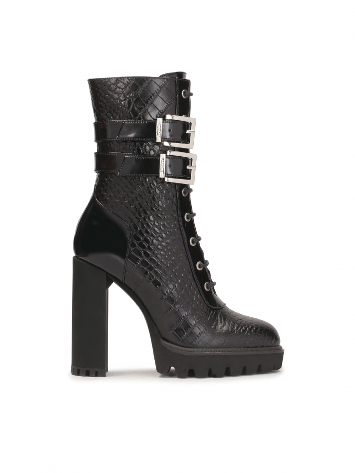 Heeled boots with high upper