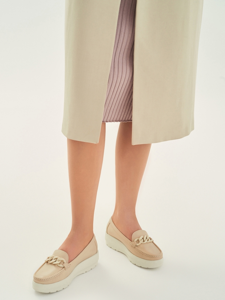 Ladies’ trendy leather moccasins on a thick sole