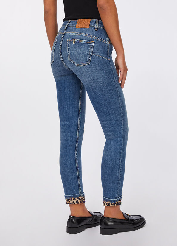 Jeans skinny con risvolto