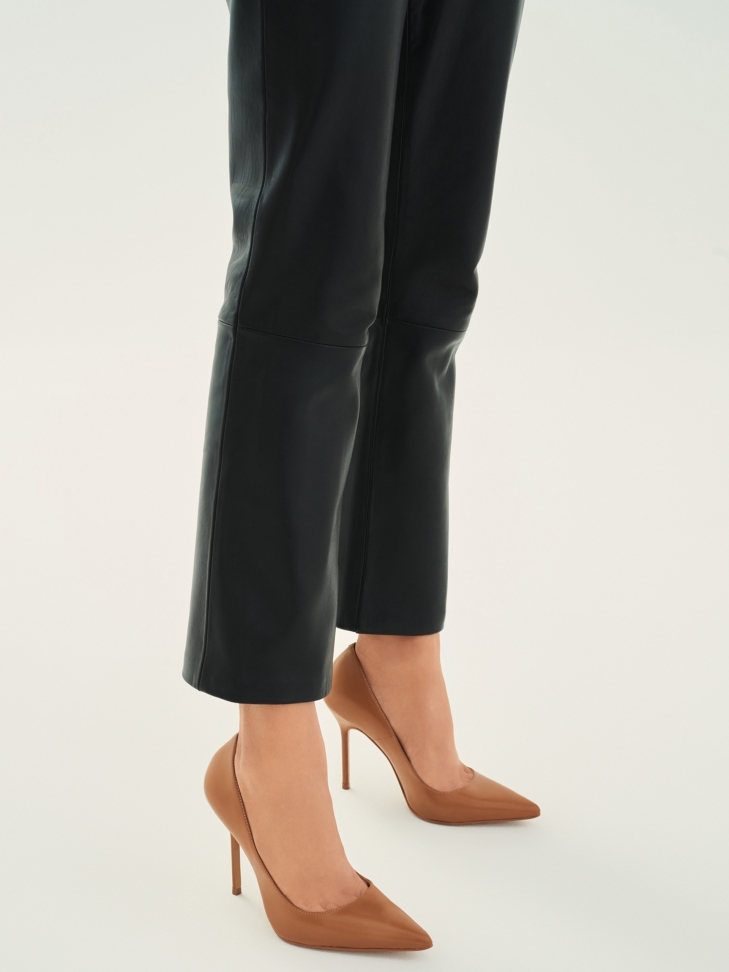 Light brown leather stilettos on a sleek heel