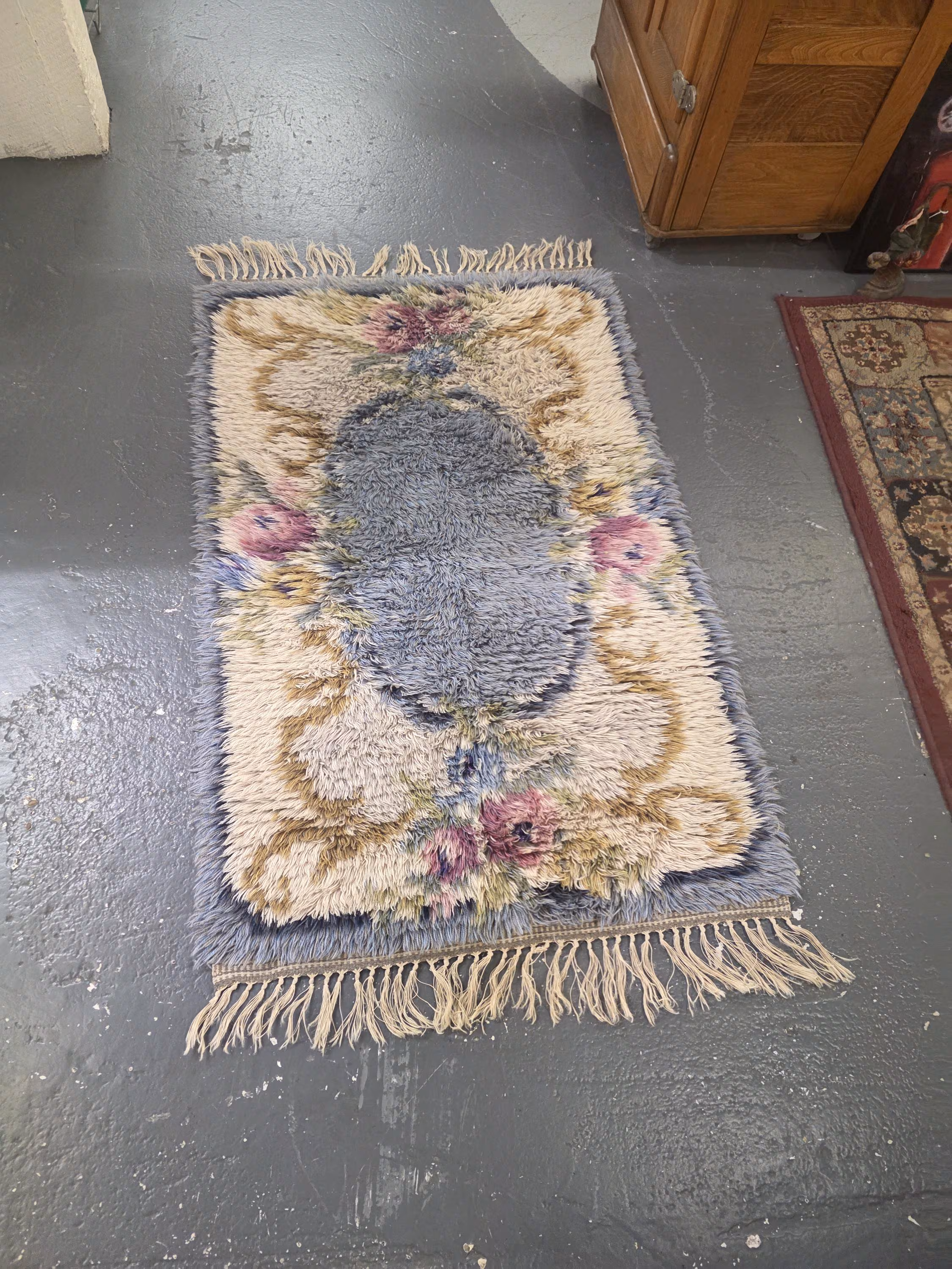 Handmade Made in Sweden, Multi-Colored Rya Rug, Blue and Brown Oval Center, 52 inches by 26 inches, Mid Century, Rare Find