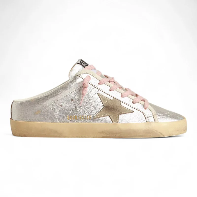 Super-Star Sabots in silver metallic leather with a suede star detail