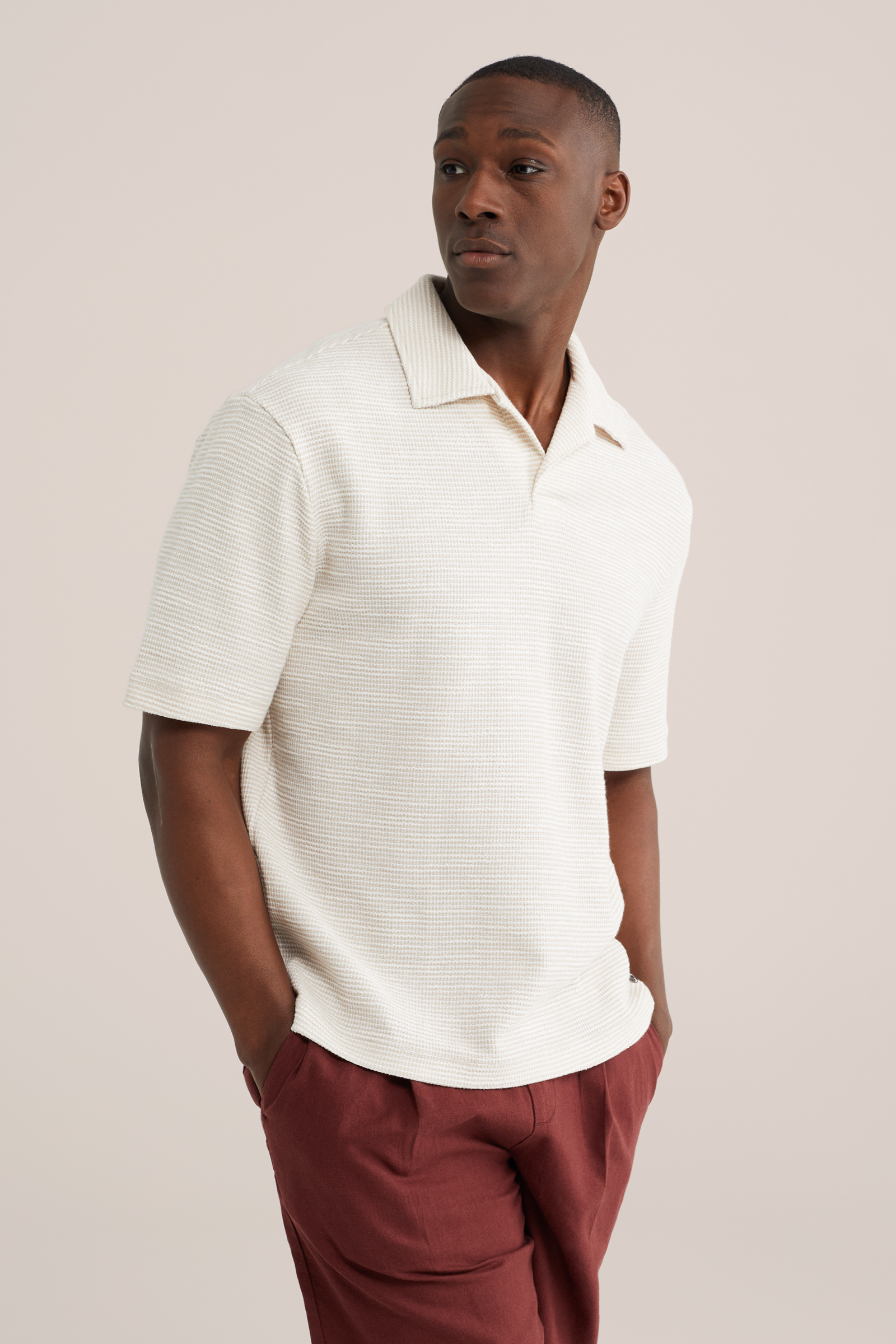 Heren relaxed fit polo met structuur