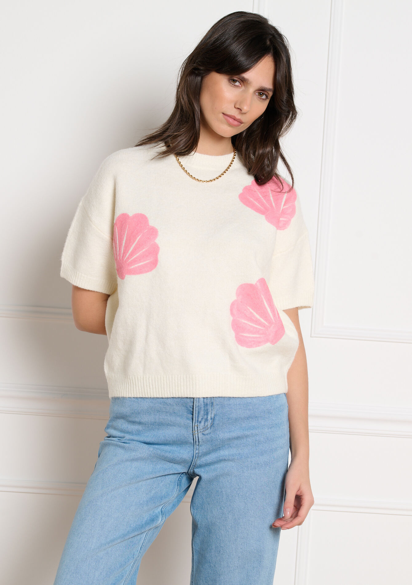 Trui met schelpen en pailletten