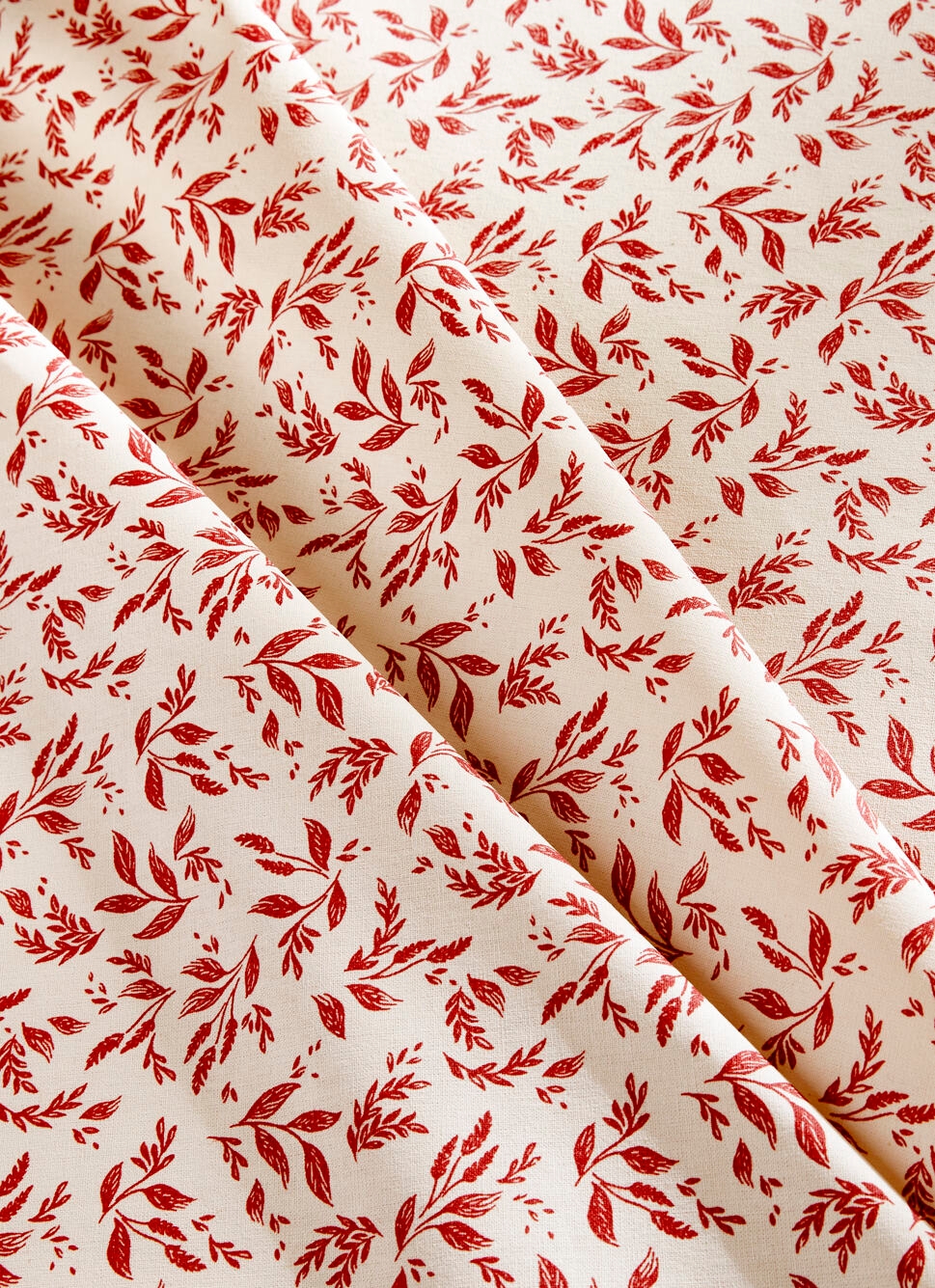 NAPPE ENDUITE à MOTIF VÉGÉTAL BEIGE / BORDEAUX