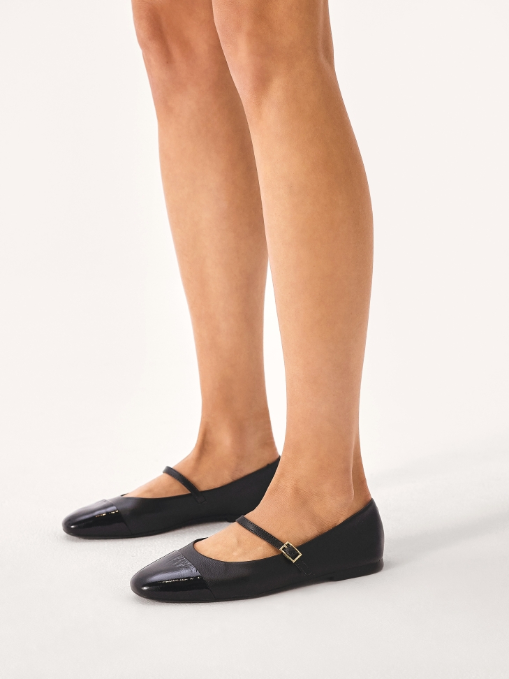 Black ballerinas with patent leather noses