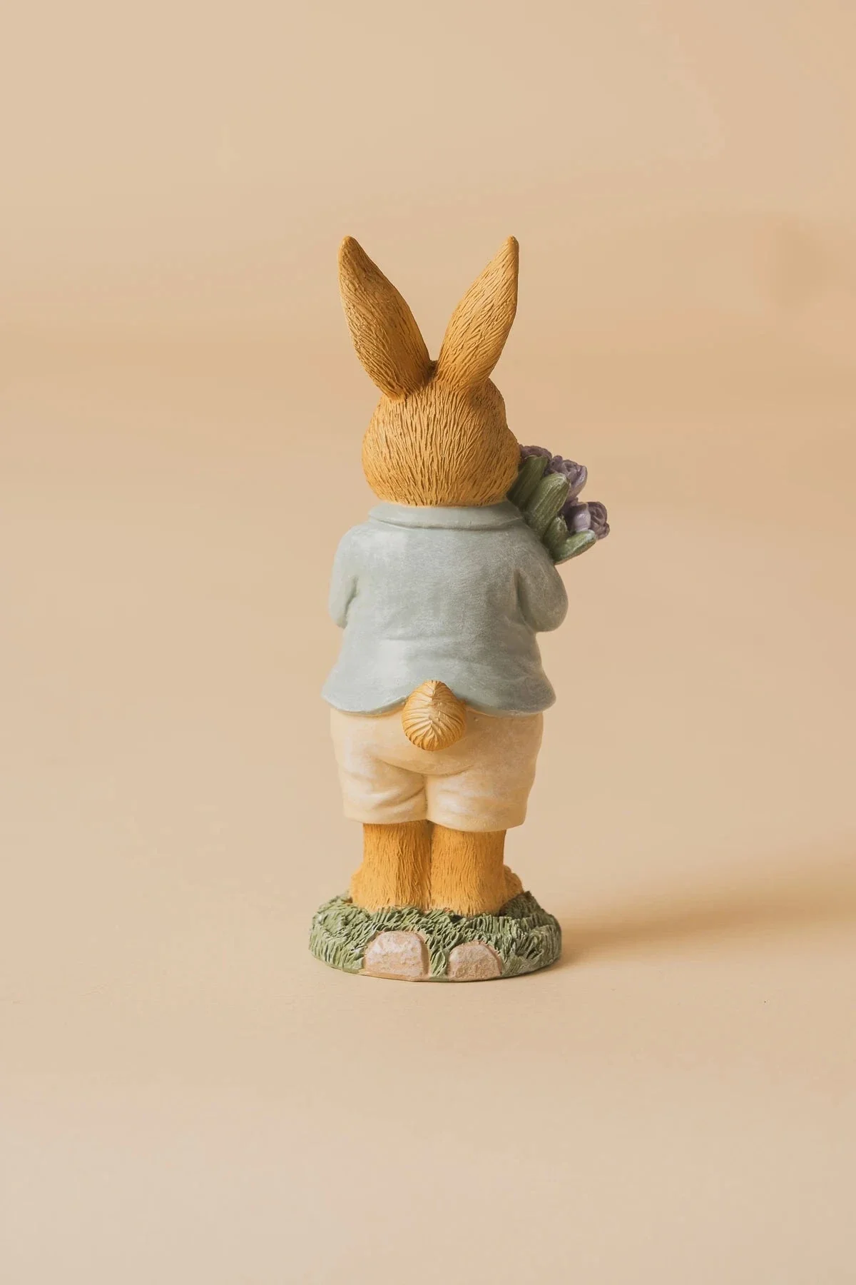 Small Boy Bunny Holding Flowers