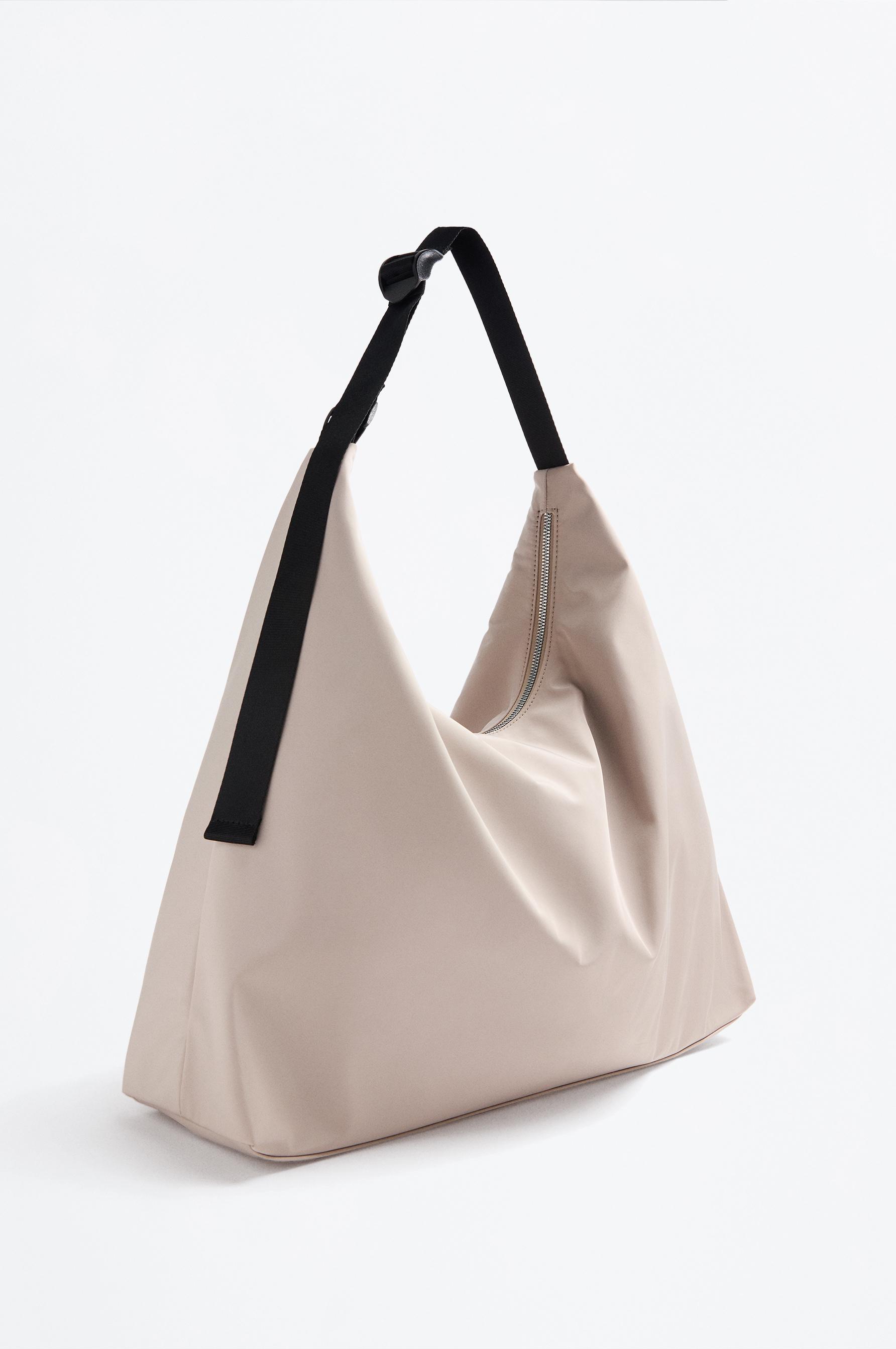 Bolso saco nailon cinturón