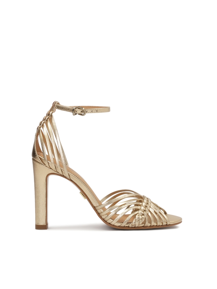 Golden sandals with woven straps