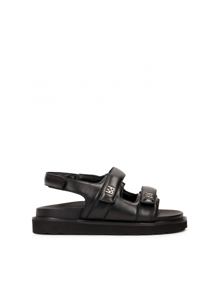 Black flat sandals with velcro straps