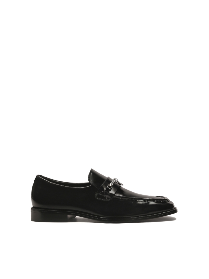 Black loafers with jewelry embellishment