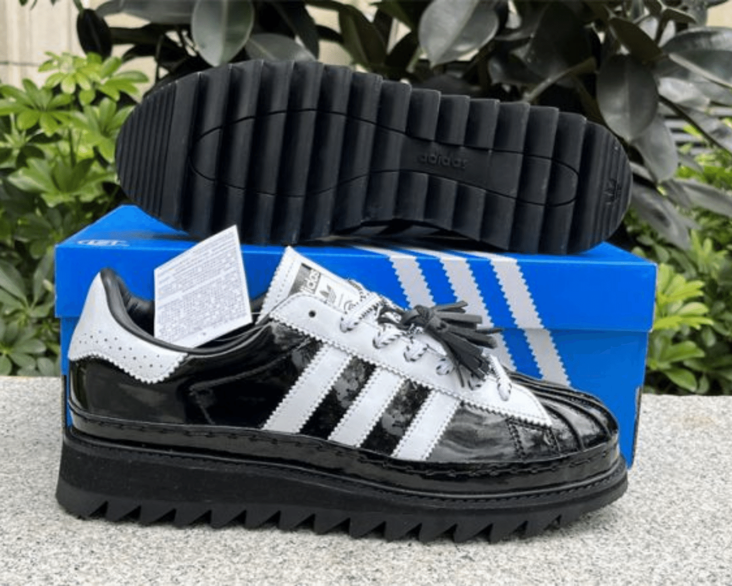 The adidas Originals x CLOT Superstar Core Black
