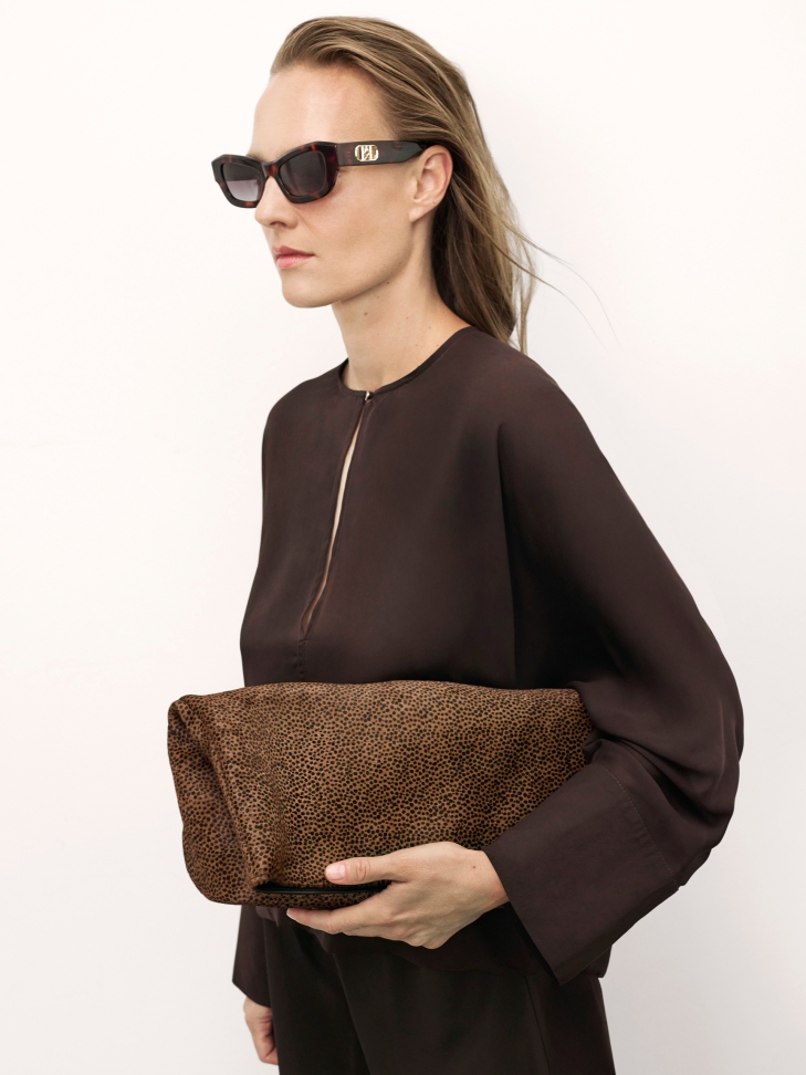 Leather handbag with natural bristles in shades of brown and black