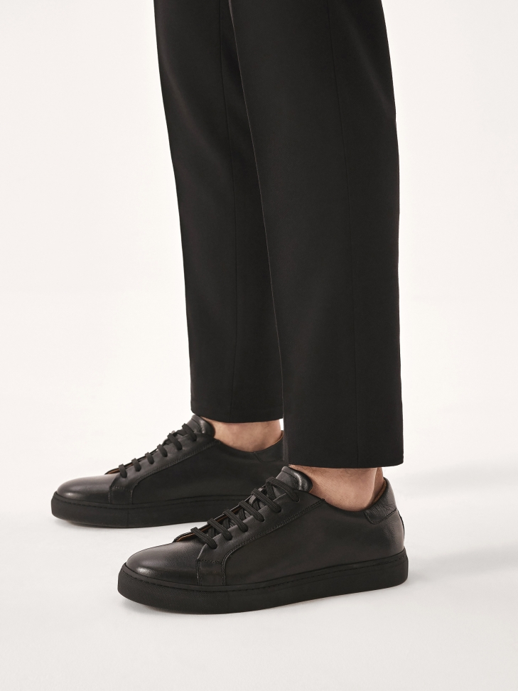 Black leather minimal style sneakers