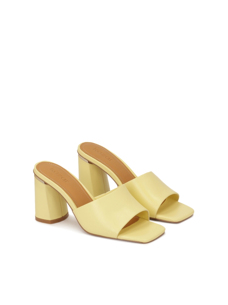 Yellow mules on a block