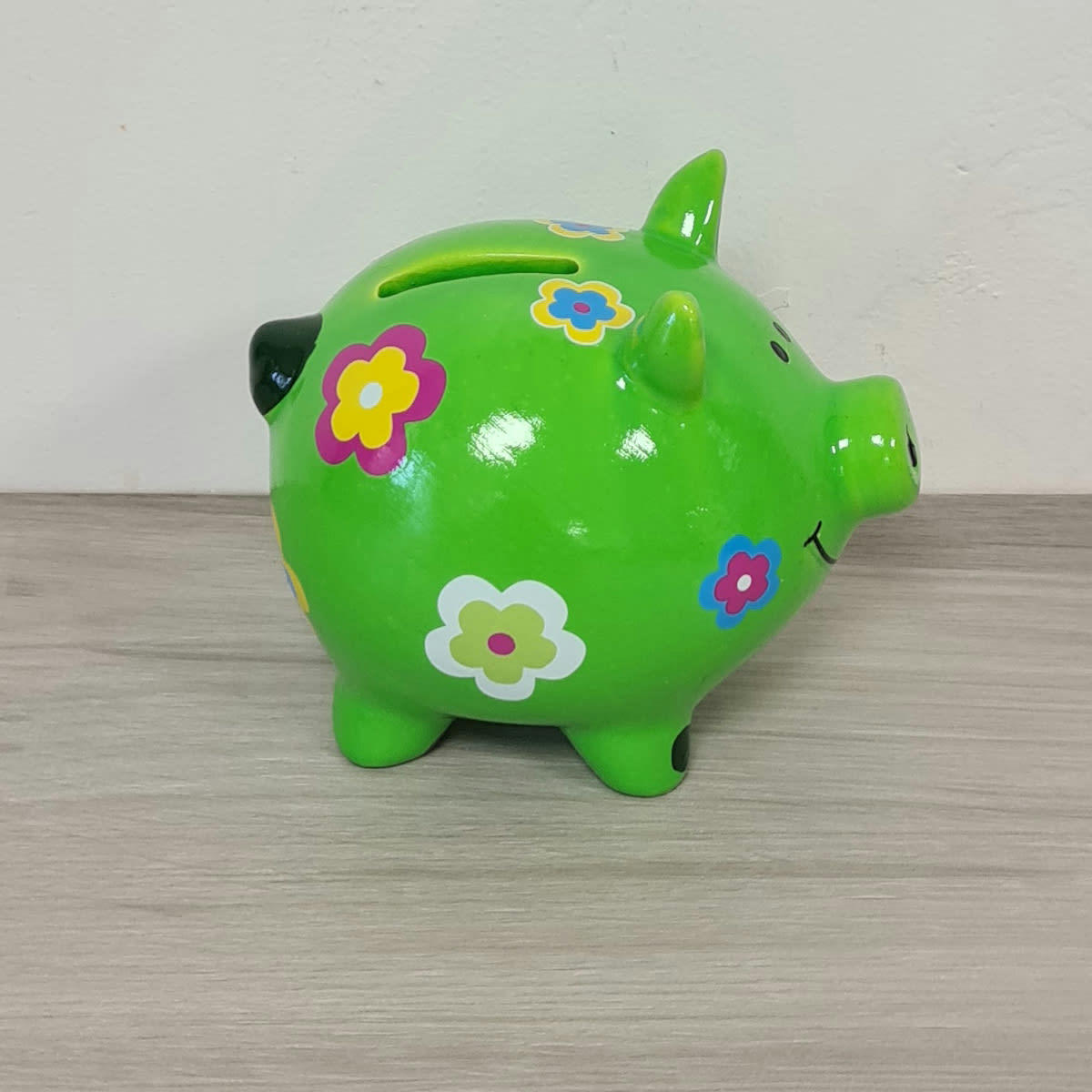 - Petite tirelire cochon vert