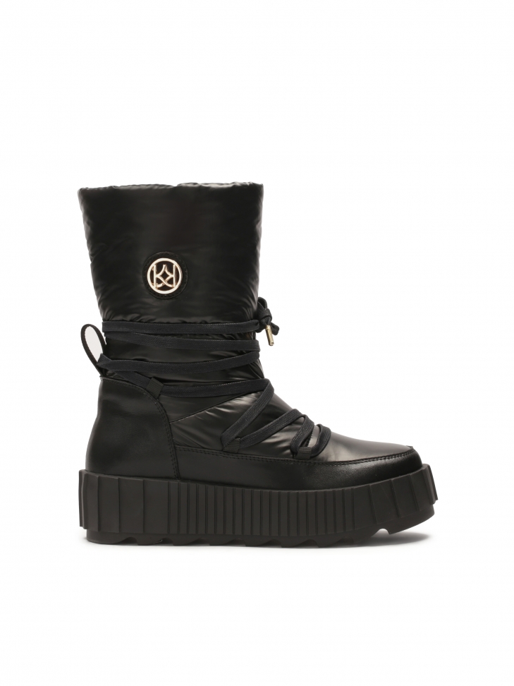 Insulated black snow boots with slip-on upper