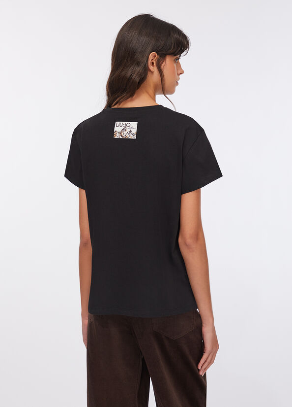 T-shirt con scritta ricamata