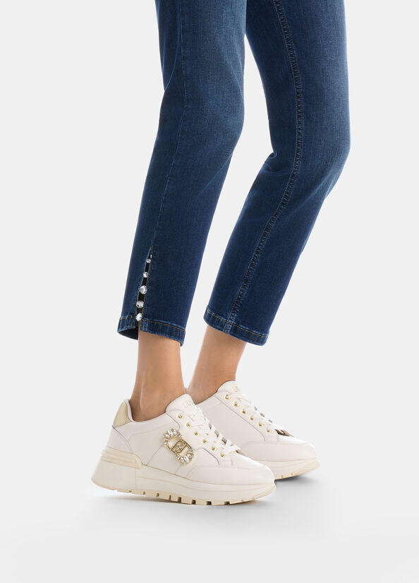 Sneakers in pelle con logo gioiello