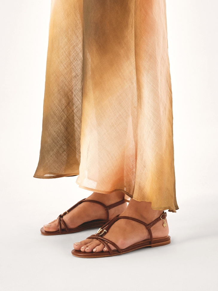 Brown flat sandals in full grain leather