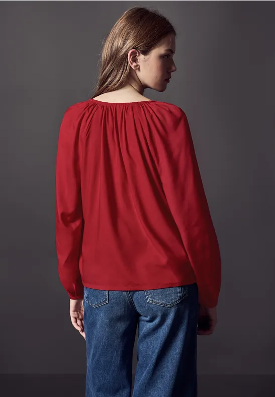 Bluse mit Raffungen