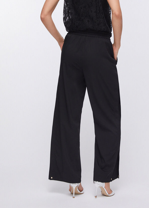 Pantaloni con spacchetti