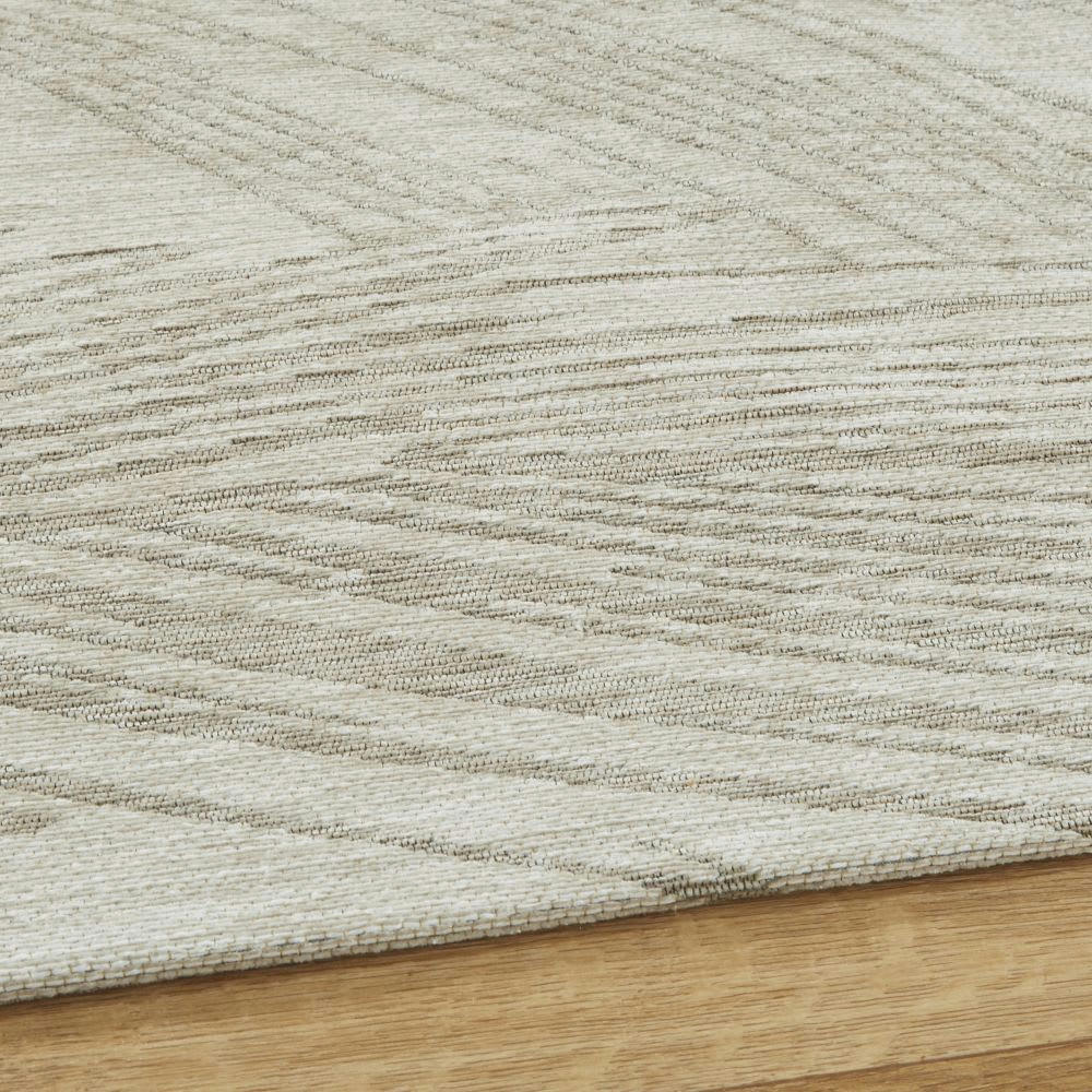 HONAKI - Tapis tissé jacquard écru et beige imprimé végétal 155x230