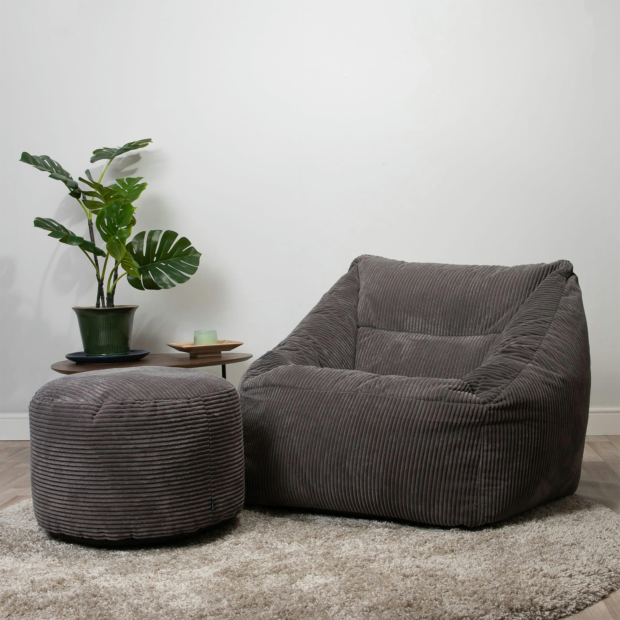 MORGAN - Pouf fauteuil avec repose-pied rond velours côtelé gris anthracite
