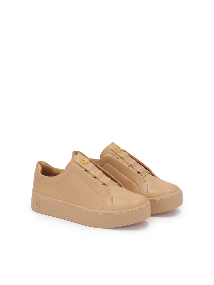 Beige sneakers on a thick sole