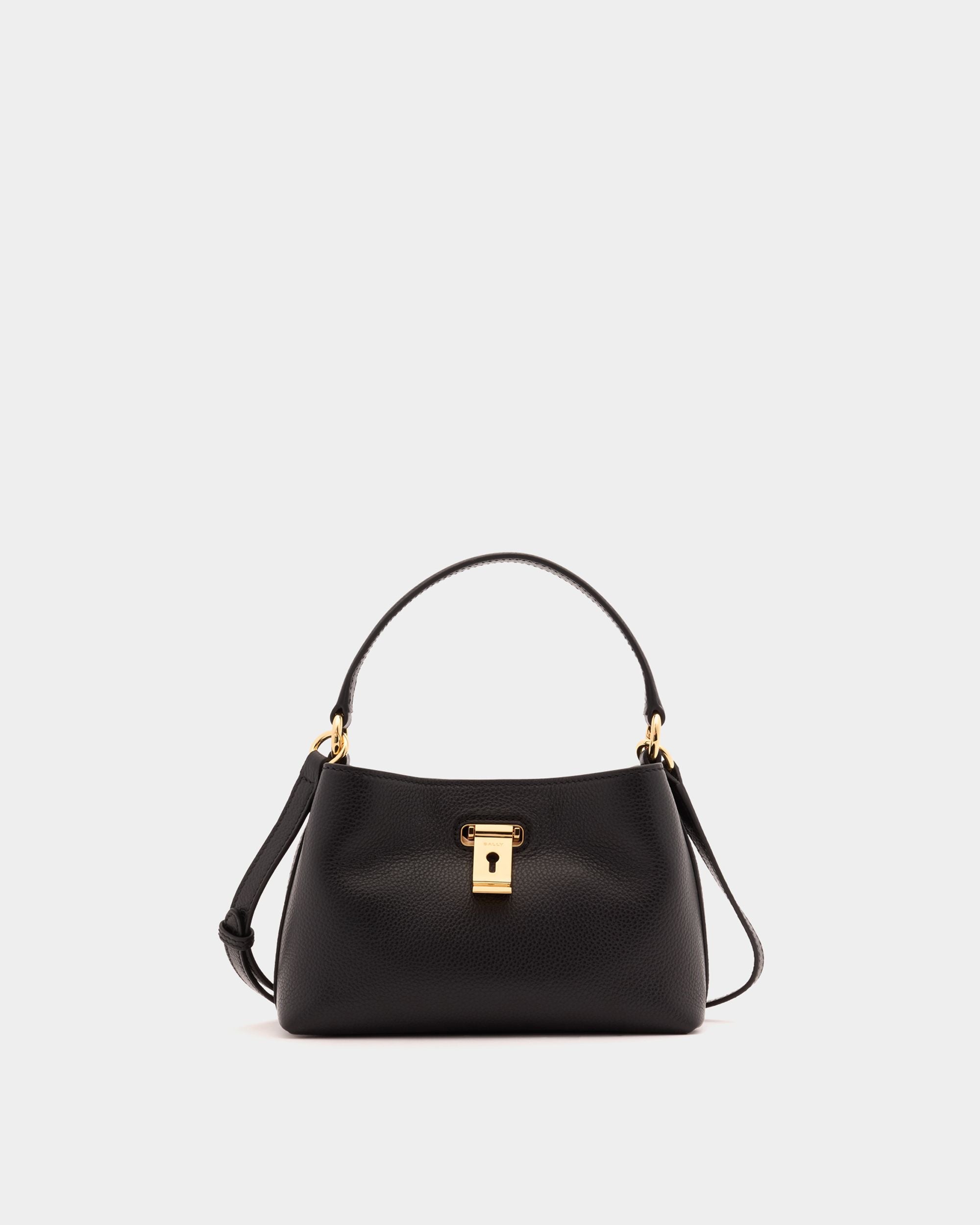 Lock Me Minitasche aus genarbtem Leder in Schwarz