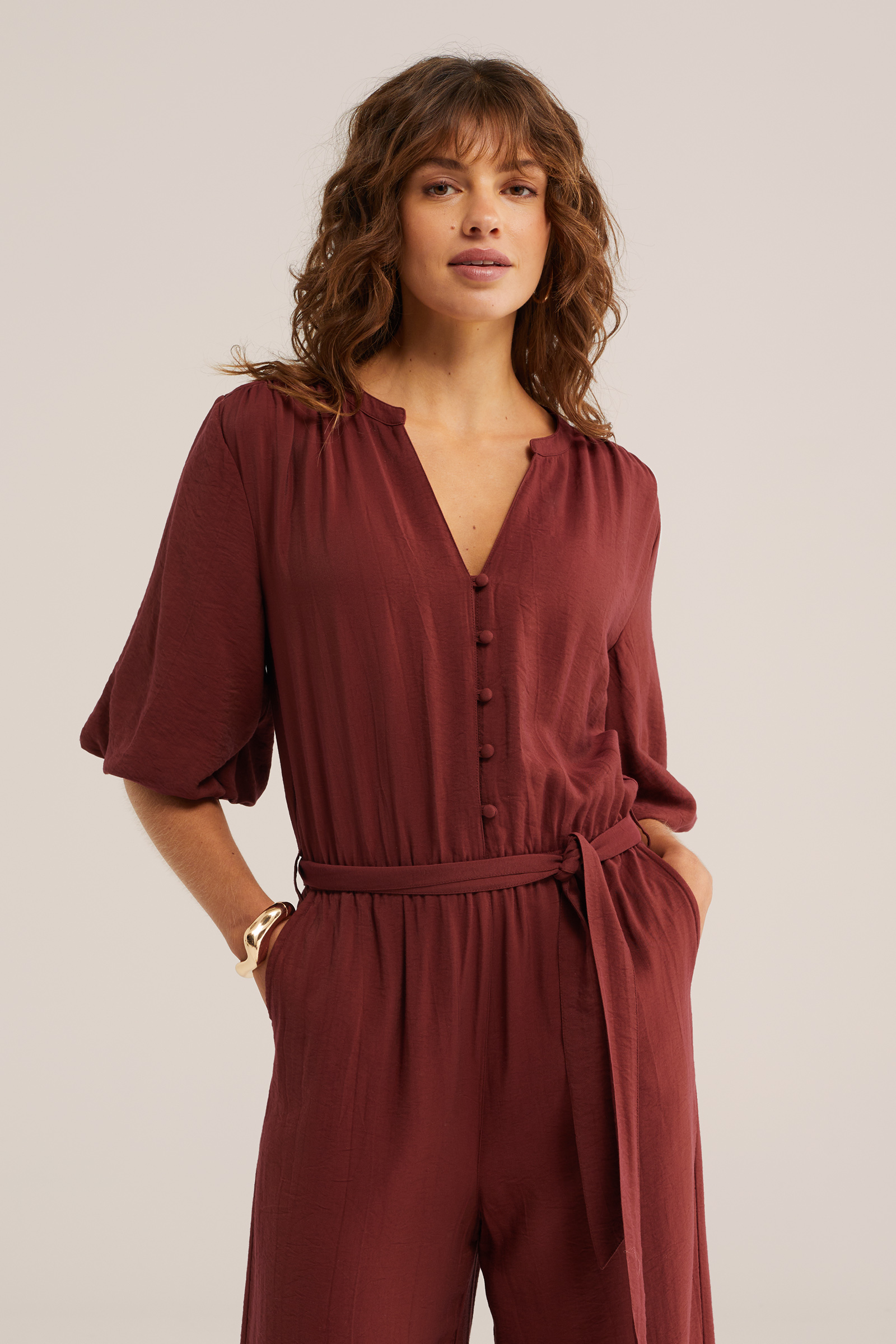 Dames jumpsuit met pofmouwen
