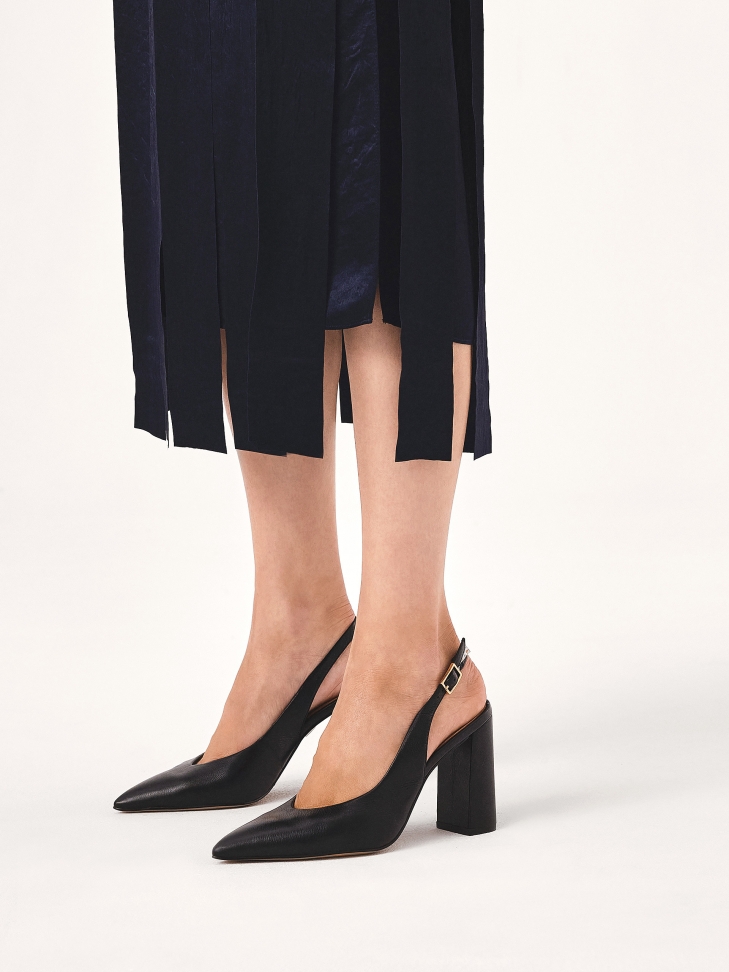 Black slingback pumps with a wide heel