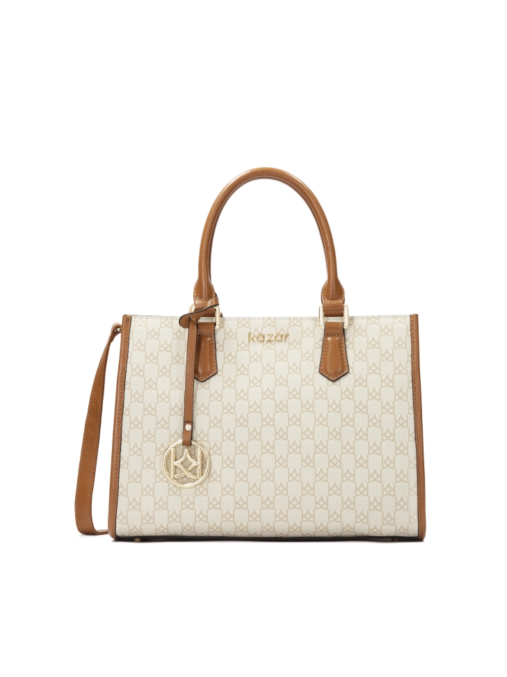 Handbag with two hand grips decorated with monograms