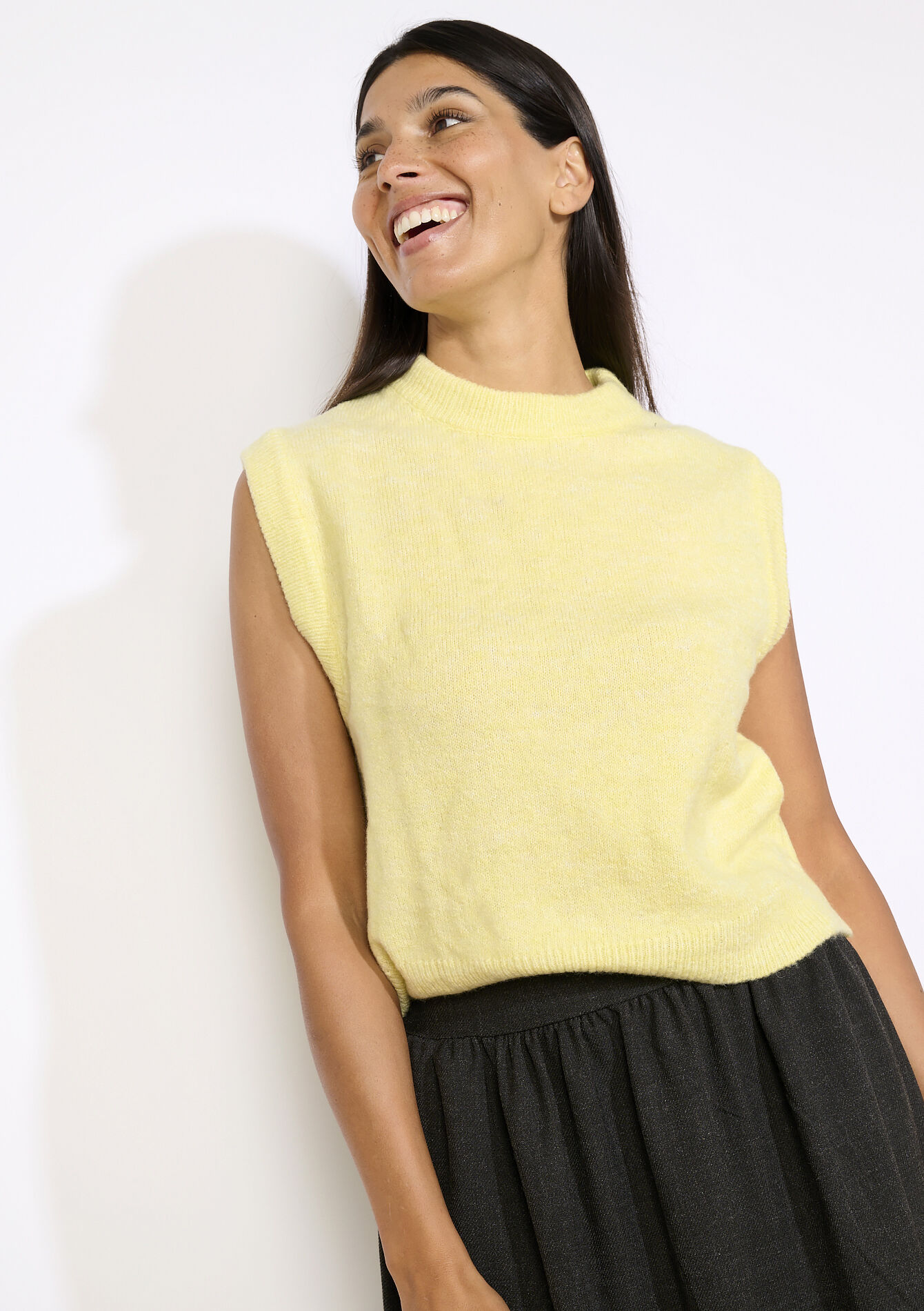 Mouwloze gebreide trui