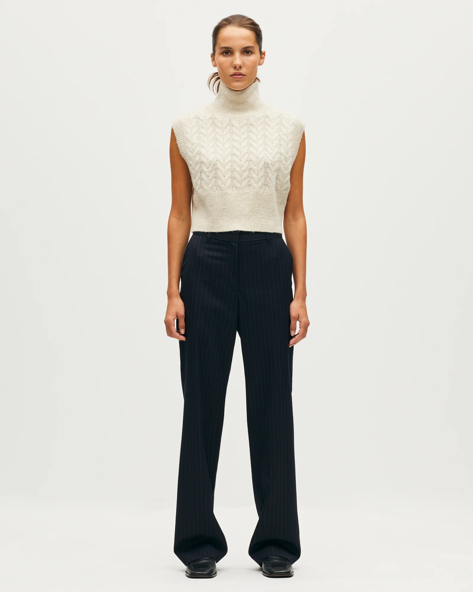 Pull sans manche col montant