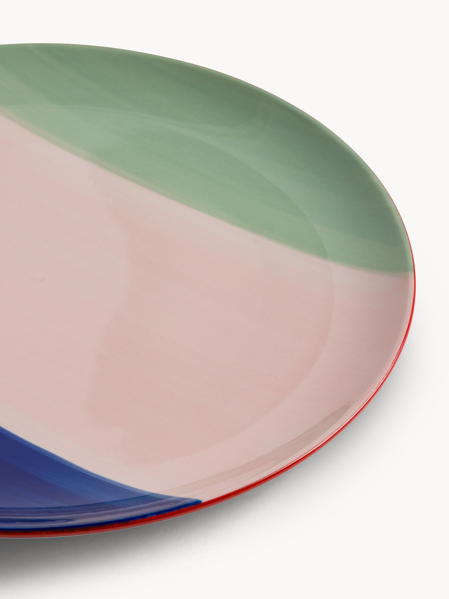 Piatto piano in ceramica a righe colorate