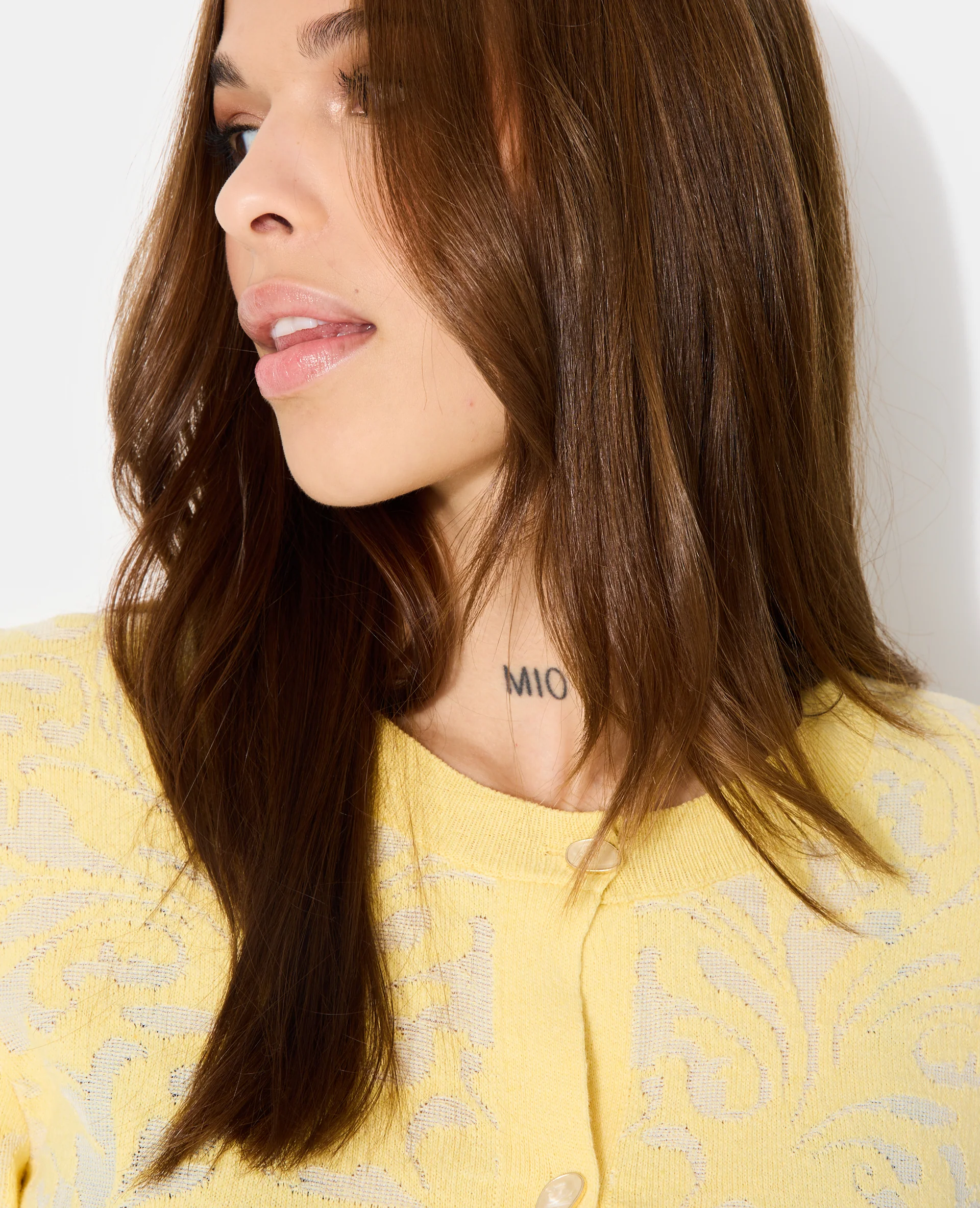 Gilet en maille effet jacquard avec boutons fantaisie