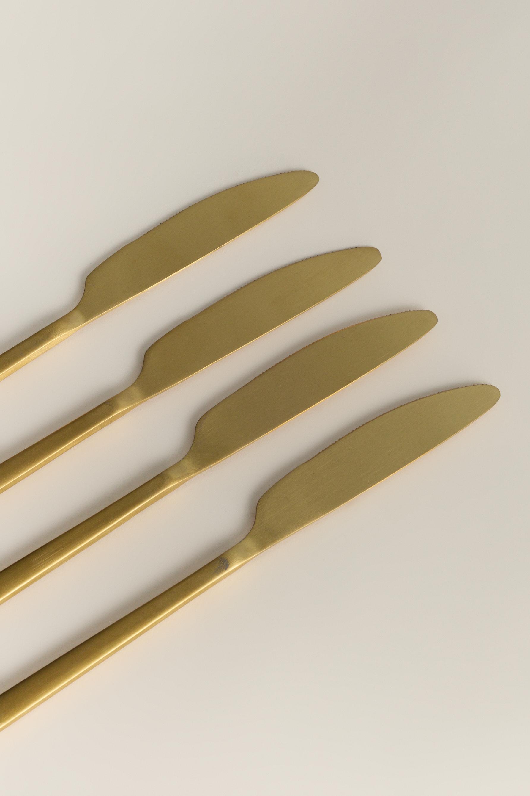 Pack 4 cuchillos dorados