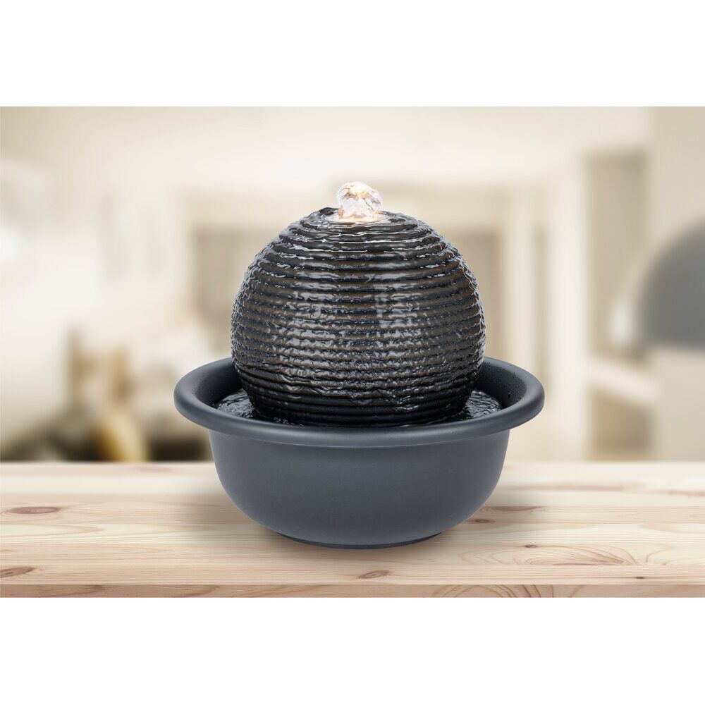 Fontaine à eau électrique forme boule noire plastique et métal 18,5xH18cm