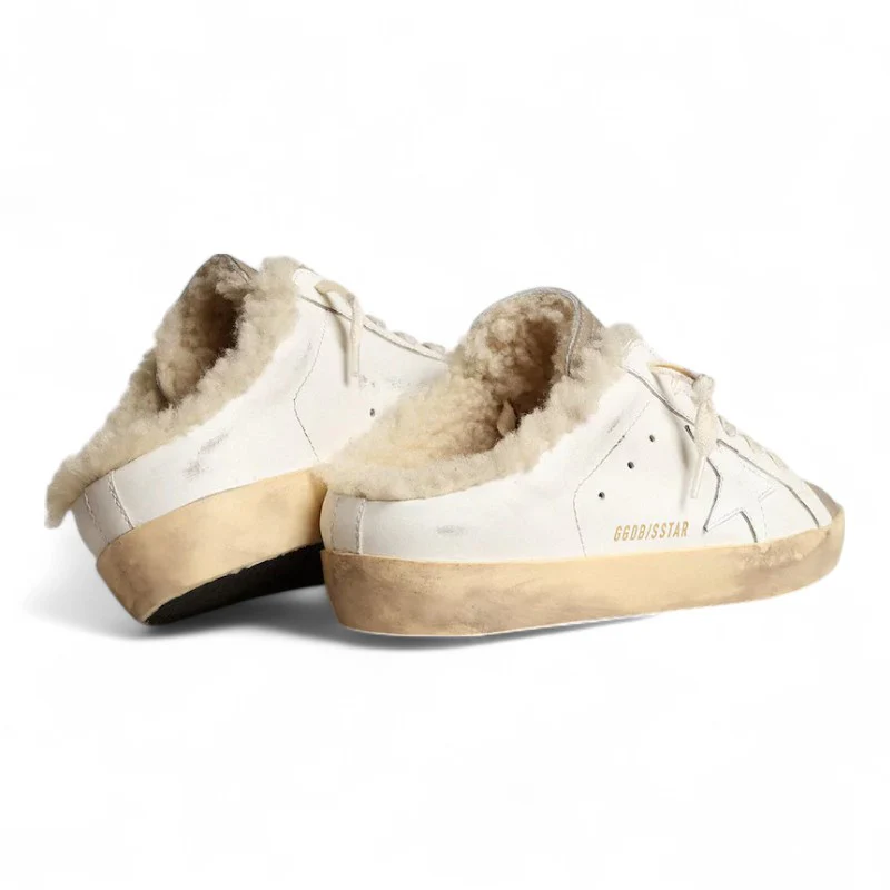 Super-Star Sabots with a white leather star and shearling lining