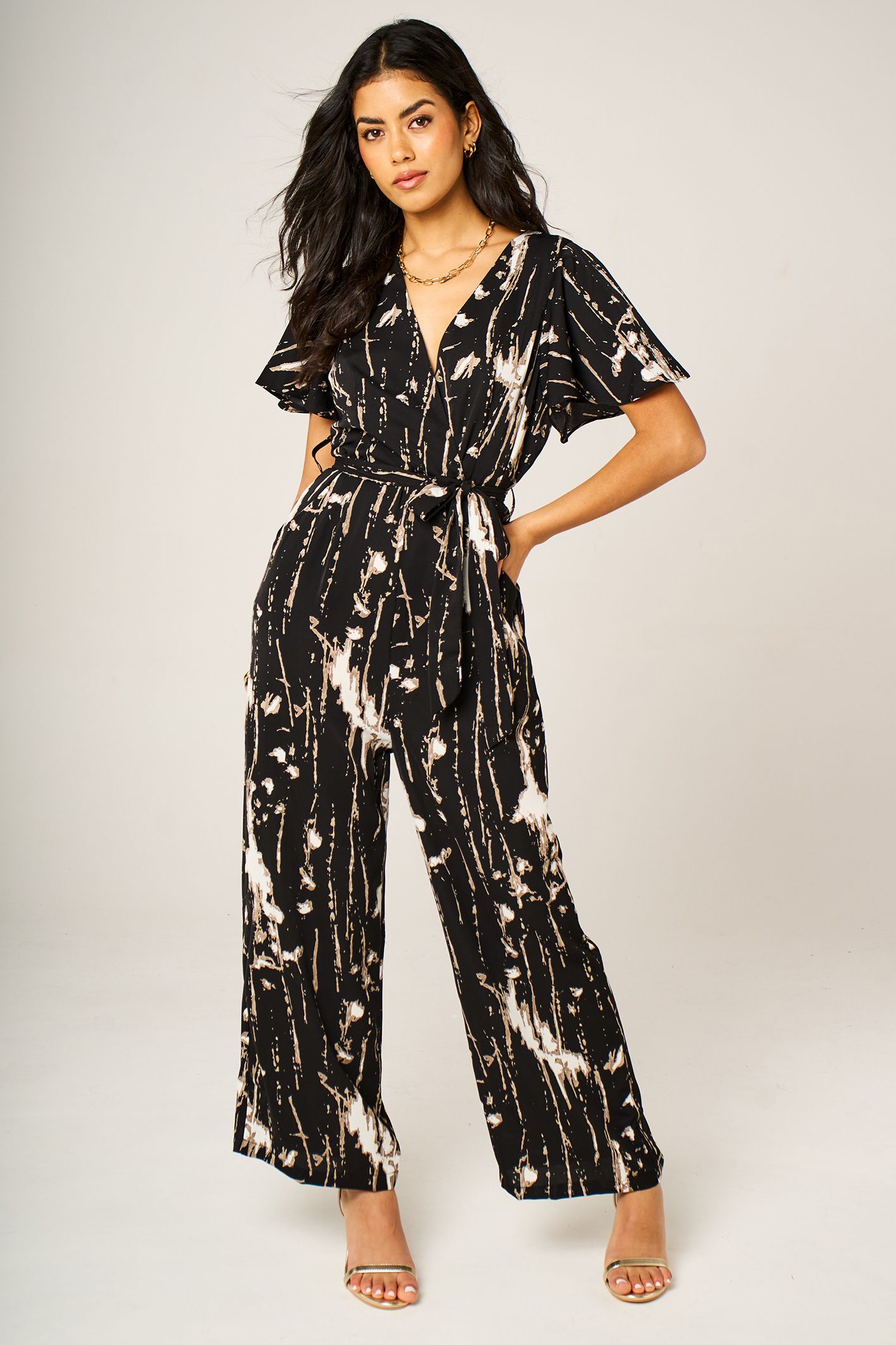 FS Collection Abstract Pattern Wrap Top Jumpsuit with Wide Leg In Black